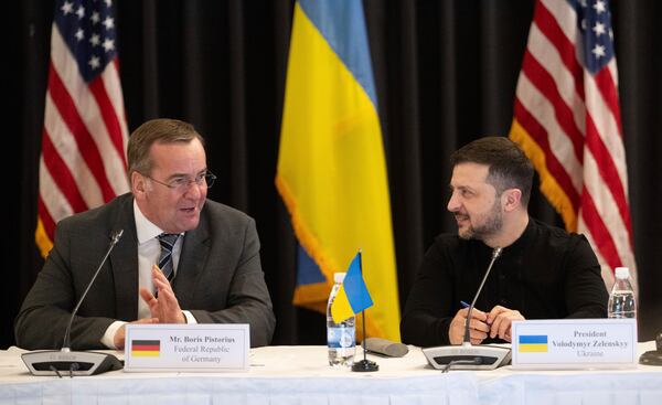 Ukrainian President Volodymyr Zelenskyy, right, and German Defence Minister Boris Pistorius attend a meeting of the Ukraine Contact Group at Ramstein Air Base, Germany, Thursday, Jan. 9, 2025. (Marijan Murat/dpa via AP)