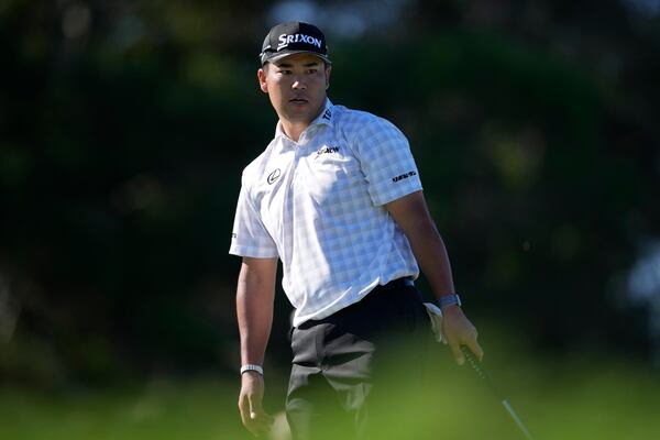 Hideki Matsuyama, of Japan, watches a missed putt at the third hole during the second round of The Sentry golf event, Friday, Jan. 3, 2025, at the Kapalua Plantation Course in Kapalua, Hawaii. (AP Photo/Matt York)