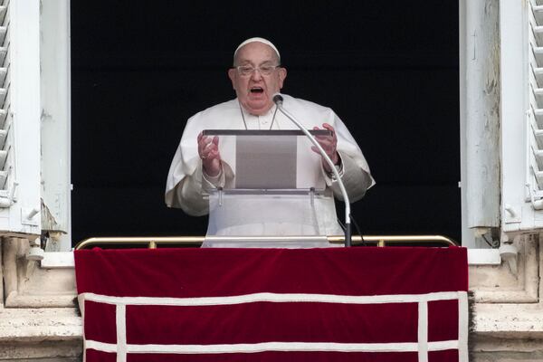 Pope Francis delivers his blessing as he recites the Angelus noon prayer from the window of his studio overlooking St.Peter's Square, at the Vatican, Sunday, Jan. 19, 2025. (AP Photo/Andrew Medichini)