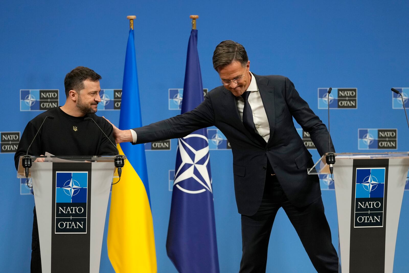 NATO Secretary General Mark Rutte, right, and Ukraine's President Volodymyr Zelenskyy participate in a media conference during a meeting of NATO defense ministers at NATO headquarters in Brussels, Thursday, Oct. 17, 2024. (AP Photo/Virginia Mayo)