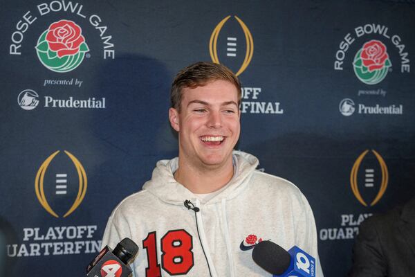 Ohio State quarterback Will Howard smiles as he talks to media on Sunday, Dec. 29, 2024, in Los Angeles, ahead of Wednesday's Rose Bowl College Football Playoff against Oregon. (AP Photo/Damian Dovarganes)