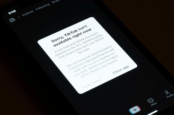 A message reading "Sorry, TikTok isn't available right now" is displayed from the TikTok app on a cell phone screen on Saturday, Jan. 18, 2025, in Los Angeles. (AP Photo/Andy Bao)