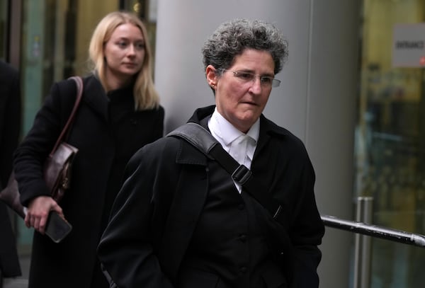 Layer Clare Montgomery departs the High Court as Prince Harry's legal action against News Group Newspapers over allegations of unlawful information gathering begins in London, Tuesday, Jan. 21, 2025. (AP Photo/Alastair Grant)