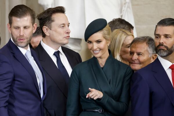 From left, Eric Trump, Elon Musk, Ivanka Trump, and Donald Trump Jr., sand together after President Donald Trump was sworn in during the 60th Presidential Inauguration in the Rotunda of the U.S. Capitol in Washington, Monday, Jan. 20, 2025.(Shawn Thew/Pool photo via AP)