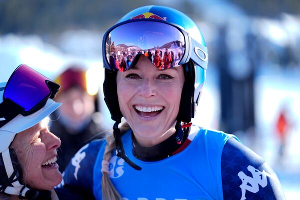 Lindsey Vonn talks with fans after racing at Copper Mountain Ski Resort, Sunday, Dec. 8, 2024, in Copper Mountain, Colo. (AP Photo/Robert F. Bukaty)