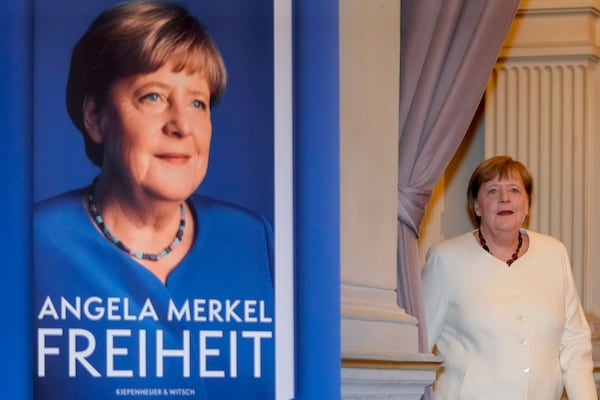 Former German Chancellor Angela Merkel arrives for the presentation of her memories in Berlin, Germany, Tuesday, Nov. 26, 2024. Book title reads "Freedom". (AP Photo/Markus Schreiber)