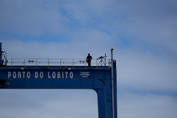 A sniper stands on a platform during President Joe Biden's tour of he Lobito Port Terminal in Lobito, Angola, on Wednesday, Dec. 4, 2024. (AP Photo/Ben Curtis)