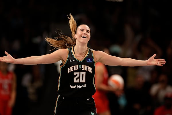 FILE - New York Liberty guard Sabrina Ionescu (20) reacts during the second half of a WNBA basketball first-round playoff game against the Atlanta Dream Tuesday, Sept. 24, 2024, in New York. The Liberty won 82-91. (AP Photo/Adam Hunger, File)