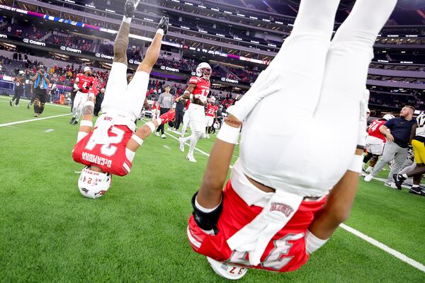 UNLV running back Darrien Jones, left, and defensive back Devin Hartsuck celebrate after the team's win against California during the LA Bowl NCAA college football game Wednesday, Dec. 18, 2024, in Inglewood, Calif. (AP Photo/Ryan Sun)