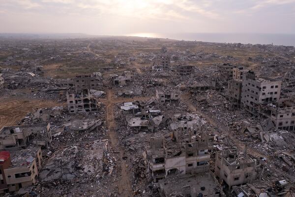 Buildings that were destroyed by the Israeli air and ground offensive are seen at the Tel al-Hawa neighbourhood in Gaza Strip, Tuesday, Jan. 28, 2025. (AP Photo/Mohamamd Abu Samra)