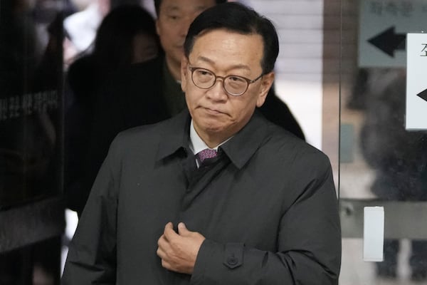 Seok Dong-hyeon, one of lawyers for South Korea's impeached President Yoon Suk Yeol, arrives at the Seoul Central District Court in Seoul, South Korea, Thursday, Jan. 16, 2025. (AP Photo/Lee Jin-man)