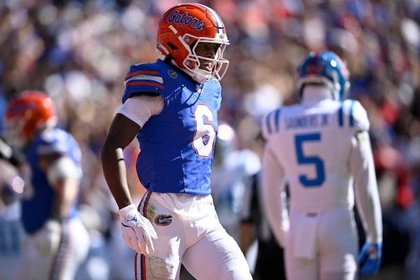 Florida wide receiver Elijhah Badger (6) celebrates his 8-yard touchdown catch against Mississippi during the first half of an NCAA college football game, Saturday, Nov. 23, 2024, in Gainesville, Fla. (AP Photo/Phelan M. Ebenhack)