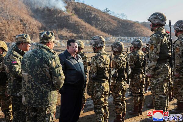 FILE - In this photo provided by the North Korean government, North Korean leader Kim Jong Un, center left, meets soldiers during a visit to a western operational training base in North Korea Wednesday, March 6, 2024. Independent journalists were not given access to cover the event depicted in this image distributed by the North Korean government. The content of this image is as provided and cannot be independently verified. Korean language watermark on image as provided by source reads: "KCNA" which is the abbreviation for Korean Central News Agency. (Korean Central News Agency/Korea News Service via AP, File)