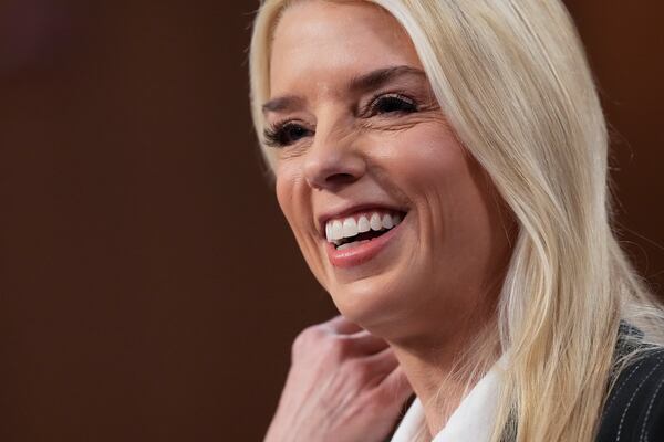 Pam Bondi, President-elect Donald Trump's choice to lead the Justice Department as attorney general, appears before the Senate Judiciary Committee for her confirmation hearing, at the Capitol in Washington, Wednesday, Jan. 15, 2025. (AP Photo/Ben Curtis)