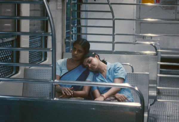 This image released by Janus and Sideshow Films shows Kani Kusruti, left, and Divya Prabha in a scene from "All We Imagine As Light." (Janus and Sideshow Films via AP)