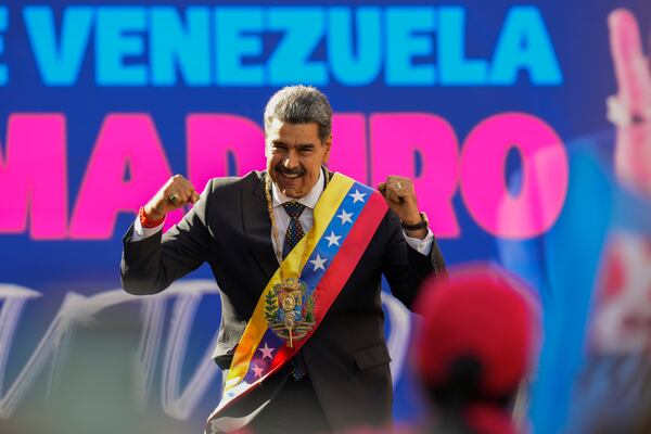 FILE - Venezuelan President Nicolas Maduro addresses government supporters after he was sworn in for a third six-year term, at the Miraflores presidential palace in Caracas, Venezuela, Jan. 10, 2025. (AP Photo/Matias Delacroix, File)