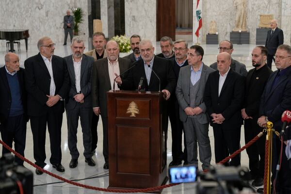 The head of Hezbollah's parliamentary bloc, Mohammed Raad, center, speaks to journalists after his meeting with Lebanese President Joseph Aoun at the presidential palace in Baabda, east of Beirut, Lebanon, Monday, Jan. 13, 2025. (AP Photo/Bilal Hussein)