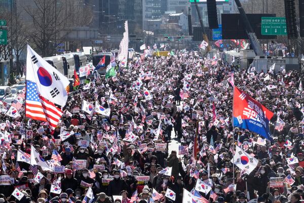 Supporters of impeached South Korean President Yoon Suk Yeol stage a rally to oppose his impeachment in Seoul, South Korea, Saturday, Jan. 25, 2025. (AP Photo/Ahn Young-joon)