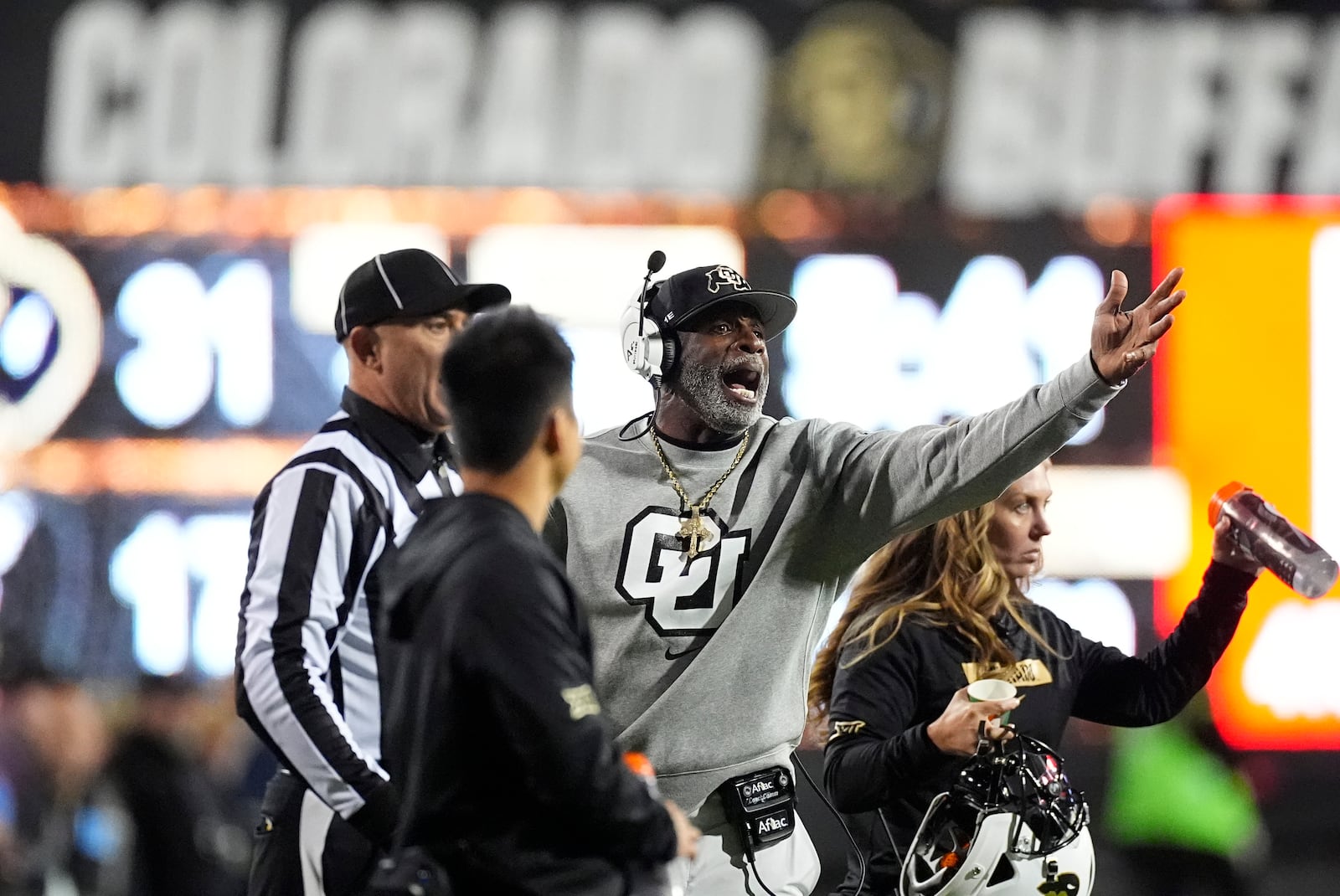 Colorado head coach Deion Sanders argues for a call in the second half of an NCAA college football game against Cincinnati Saturday, Oct. 26, 2024, in Boulder, Colo. (AP Photo/David Zalubowski)