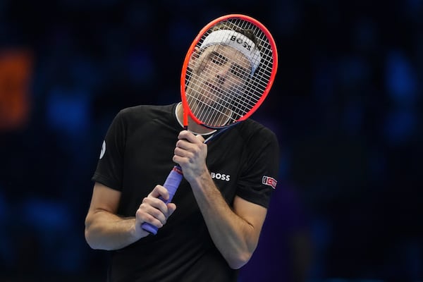 Taylor Fritz of the United States reacts during the final match of the ATP World Tour Finals against Italy's Jannik Sinner at the Inalpi Arena, in Turin, Italy, Sunday, Nov. 17, 2024. (AP Photo/Antonio Calanni)