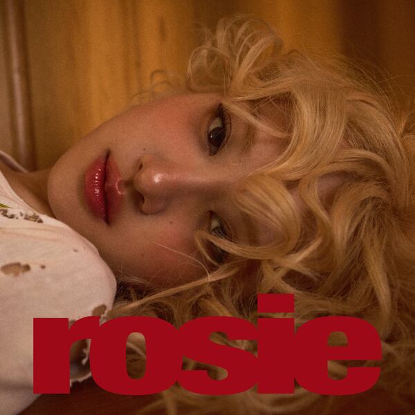 This album cover image released by Atlantic Records shows Rosé debut solo collection “rosie.” (Atlantic Records via AP)