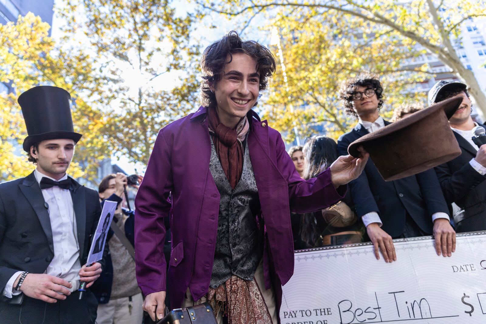 Miles Mitchell, 21, winner of the Timothee Chalamet lookalike contest near Washington Square Park, Sunday, Oct. 27, 2024, in New York. (AP Photo/Stefan Jeremiah)