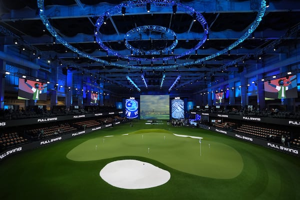 The SoFi arena is seen ahead of the inaugural match of the TMRW Golf League, between New York Golf Club and The Bay Golf Club, Tuesday, Jan. 7, 2025, in Palm Beach Gardens, Fla. TGL features six teams of four players competing against each other in a tech-infused arena the size of a football field. (AP Photo/Rebecca Blackwell)