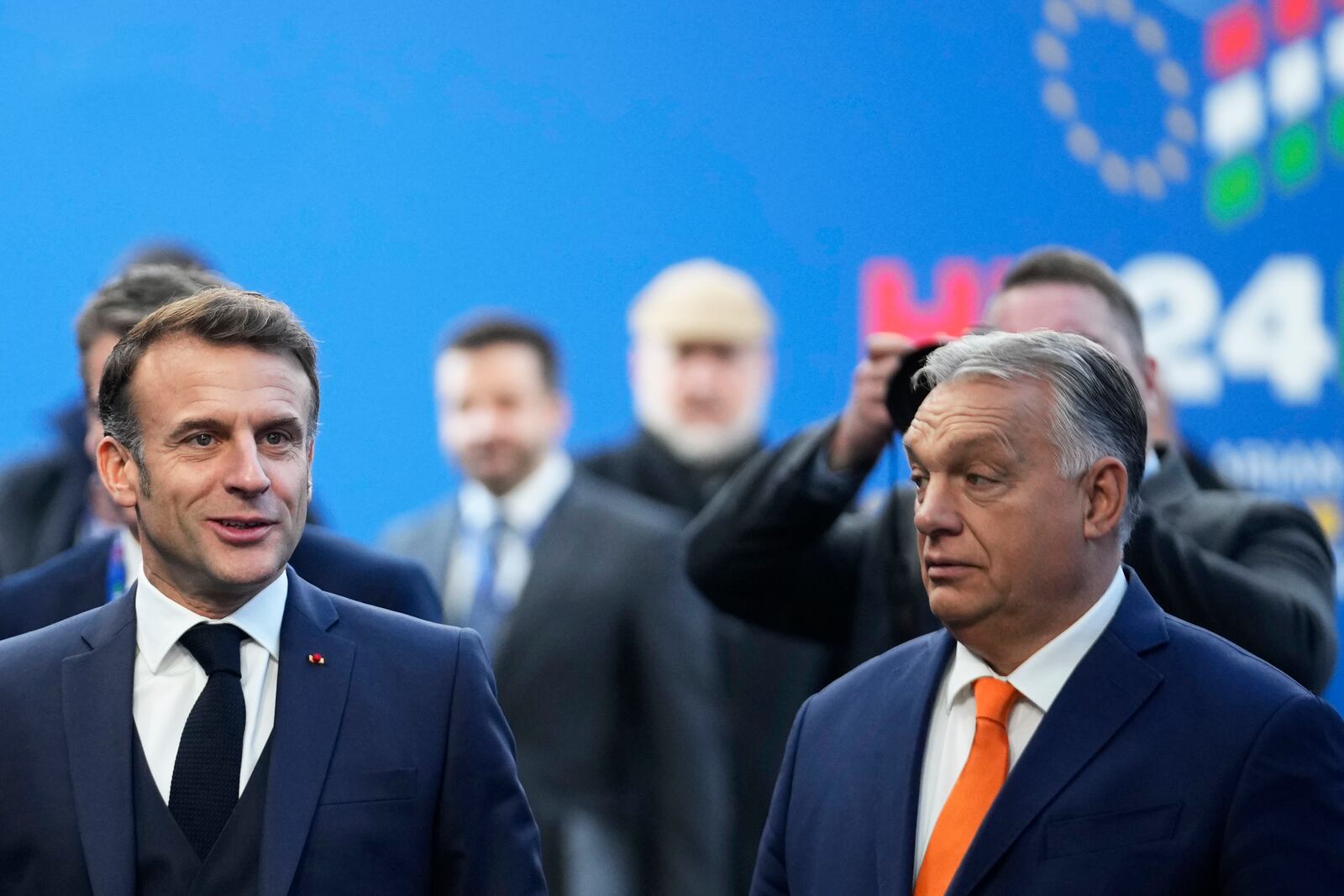 French President Emmanuel Macron, left, speaks with Hungary's Prime Minister Viktor Orban as he arrives for an EU Summit at the Puskas Arena in Budapest, Hungary, Friday, Nov. 8, 2024. (AP Photo/Petr David Josek)