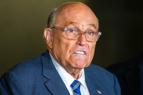 FILE - Rudy Giuliani speaks to the media outside Manhattan federal court in New York after testifying in a contempt hearing, Jan. 3, 2025. (AP Photo/Ted Shaffrey, File)