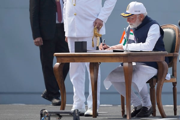 Indian Prime Minister Narendra Modi attends the commissioning ceremony of INS Surat at a naval dockyard in Mumbai, India, Wednesday, Jan. 15, 2025. (AP Photo/Rafiq Maqbool)