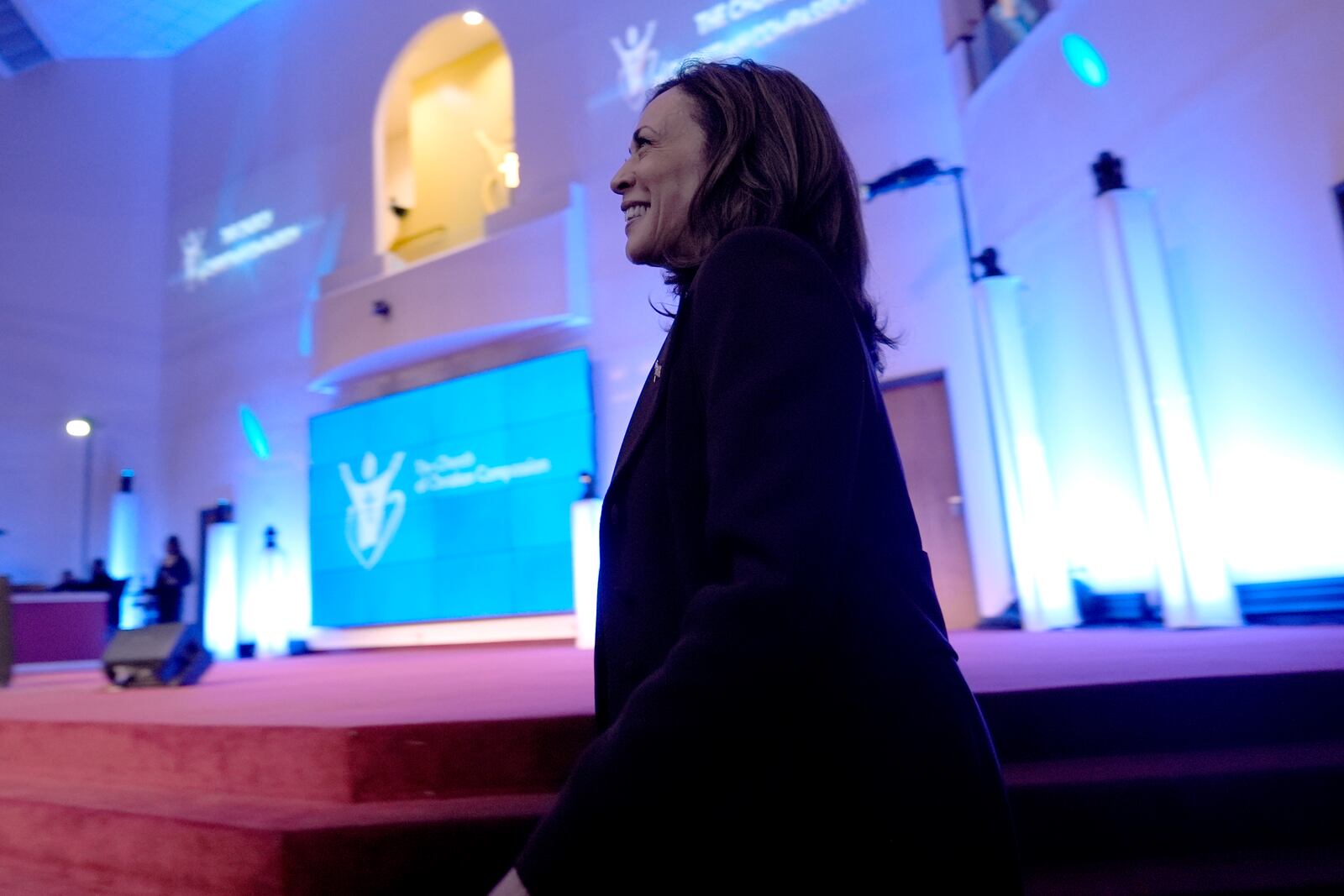 Democratic presidential nominee Vice President Kamala Harris departs the stage after speaking during a service at the Church of Christian Compassion, Sunday, Oct. 27, 2024, in Philadelphia. (AP Photo/Susan Walsh)