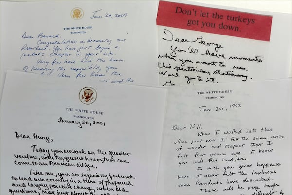 Letters from former presidents left for their successors are photographed Saturday, Jan 18, 2025, in Washington. Every president since Ronald Reagan has left a note for his successor, and President Joe Biden could be the first to write a letter to someone who is both his successor and the predecessor who left a note for him. (AP Photo/Jon Elswick)