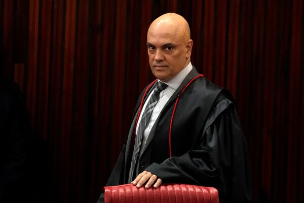 FILE - Brazilian Supreme Court Chief Justice Alexandre de Moraes arrives for a court hearing in Brasilia, Brazil, June 22, 2023. (AP Photo/Eraldo Peres, File)