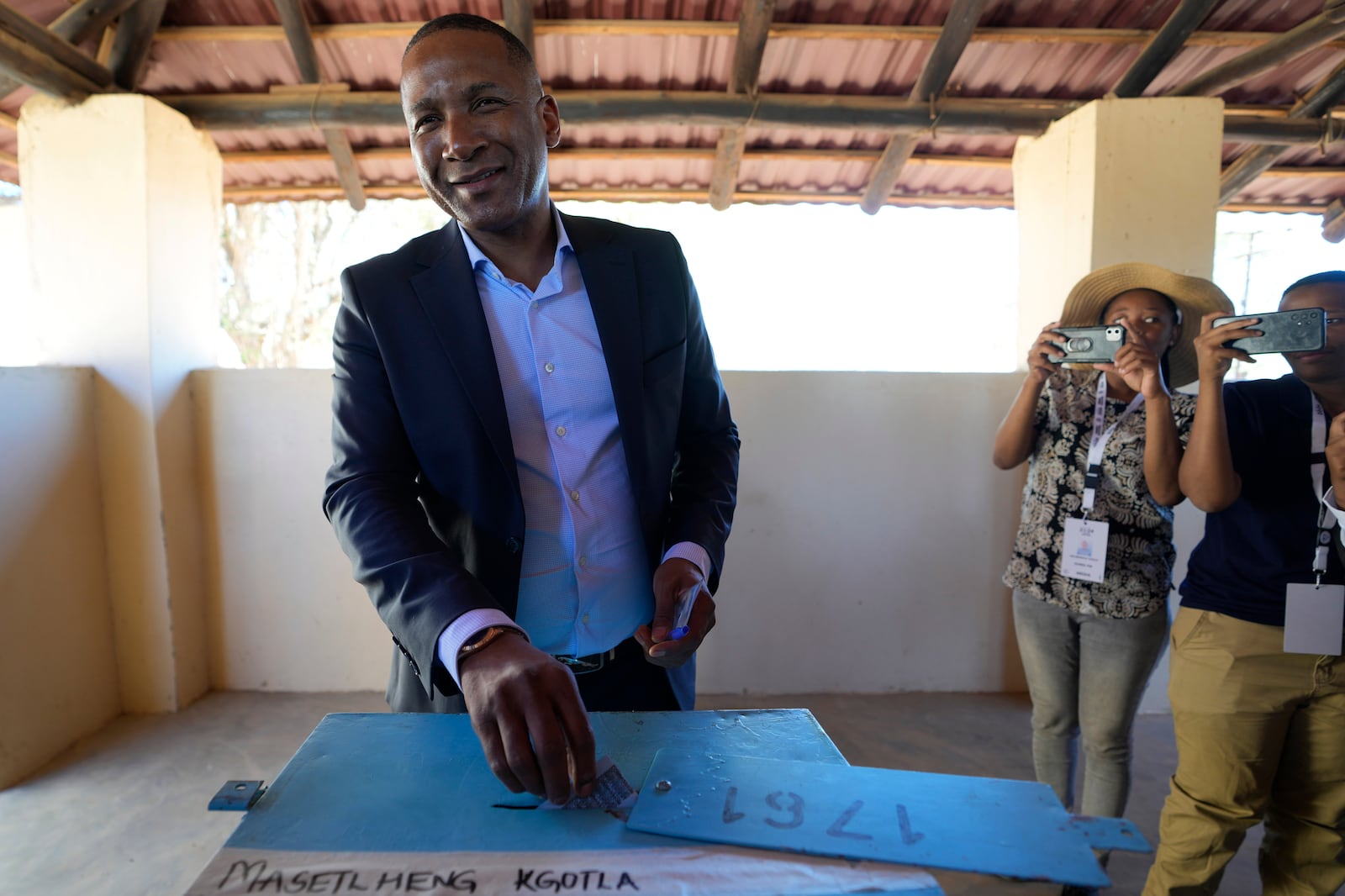 Umbrella for Democratic Change (UDC) presidential candidate Duma Boko casts his ballot during the elections in Gaborone, Botswana, Wednesday, Oct. 30, 2024. (AP Photo/Themba Hadebe)