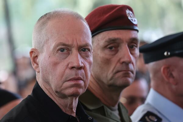 FILE - Israel's then Defense Minister Yoav Gallant, left, and Chief of the General Staff Lieutenant-General Herzi Halevi, attend a ceremony marking the Hebrew calendar anniversary of the Hamas attack on October 7 last year that sparked the ongoing war in Gaza, at the Mount Herzl military cemetery in Jerusalem, Israel Sunday Oct. 27, 2024. (Gil Cohen-Magen/Pool Photo via AP, File)