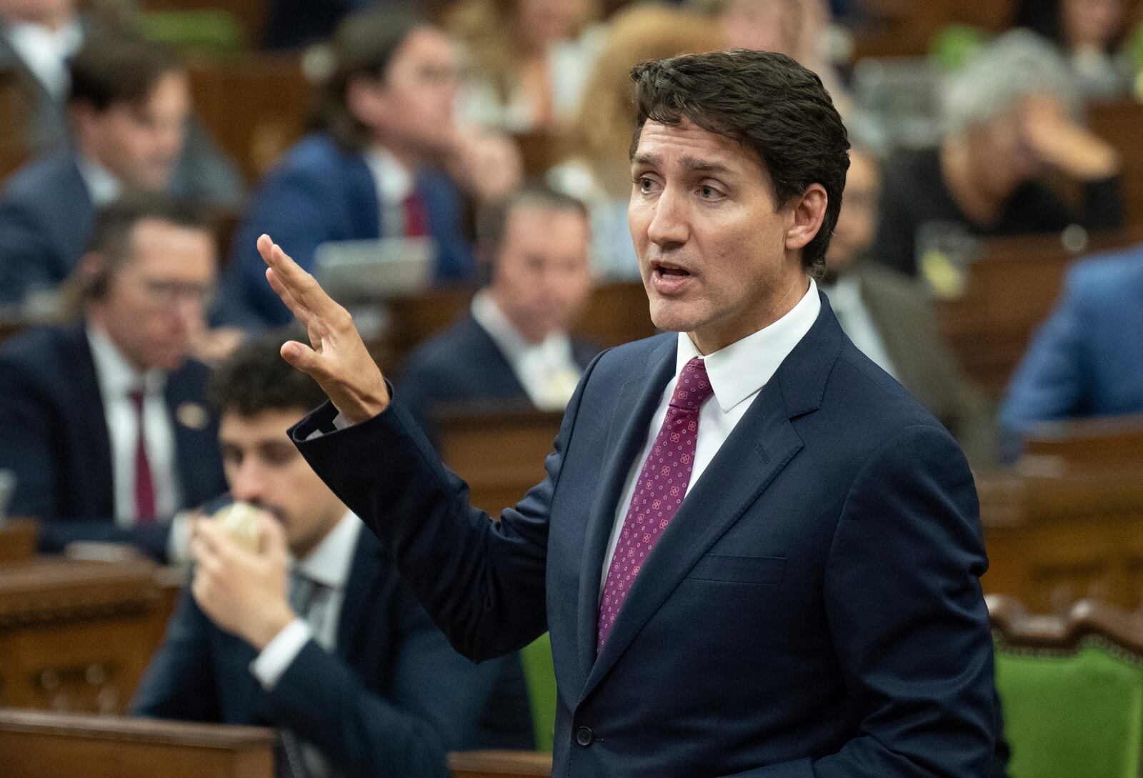 Canada Prime Minister Justin Trudeau rises during Question Period in Ottawa, Tuesday, Oct. 22, 2024. (Adrian Wyld/The Canadian Press via AP)