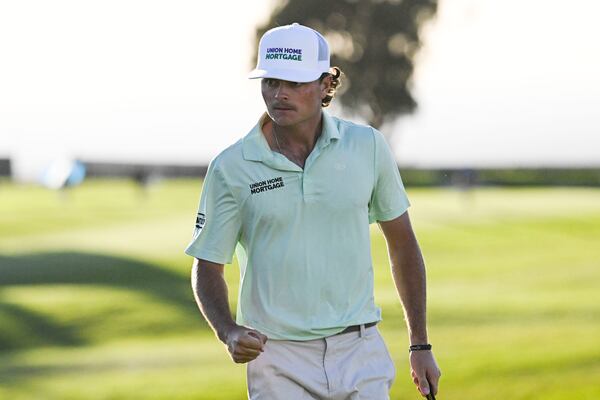 Luke Clanton pumps his fist after hitting a birdie putt on the 13th hole of the South Course at Torrey Pines during the second round of the Farmers Insurance Open golf tournament Thursday, Jan. 23, 2025, in San Diego. (AP Photo/Denis Poroy)