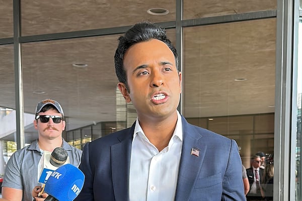 FILE - Biotech entrepreneur and former Republican presidential candidate Vivek Ramaswamy speaks with reporters ahead of a town hall, Sept. 19, 2024, in Springfield, Ohio. (AP Photo/Julie Carr Smyth, File)