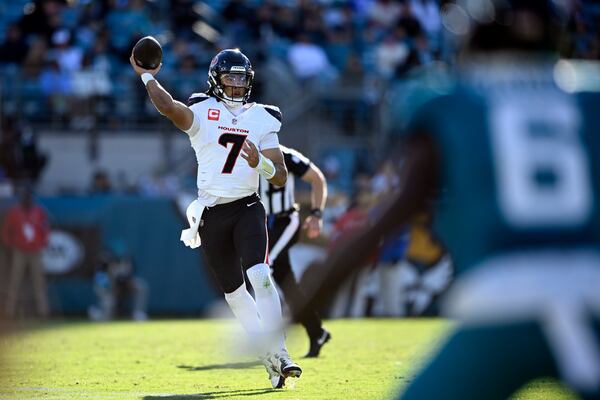 Houston Texans quarterback C.J. Stroud (7) throws a pass against the Jacksonville Jaguars during the second half of an NFL football game Sunday, Dec. 1, 2024, in Jacksonville, Fla. (AP Photo/Phelan M. Ebenhack)