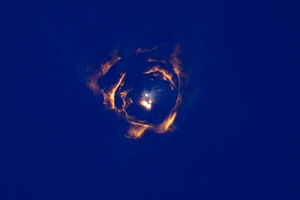 SpaceX's mega rocket Starship and booster separate during a test flight from Starbase in Boca Chica, Texas, Thursday, Jan. 16, 2025. (AP Photo/Eric Gay)