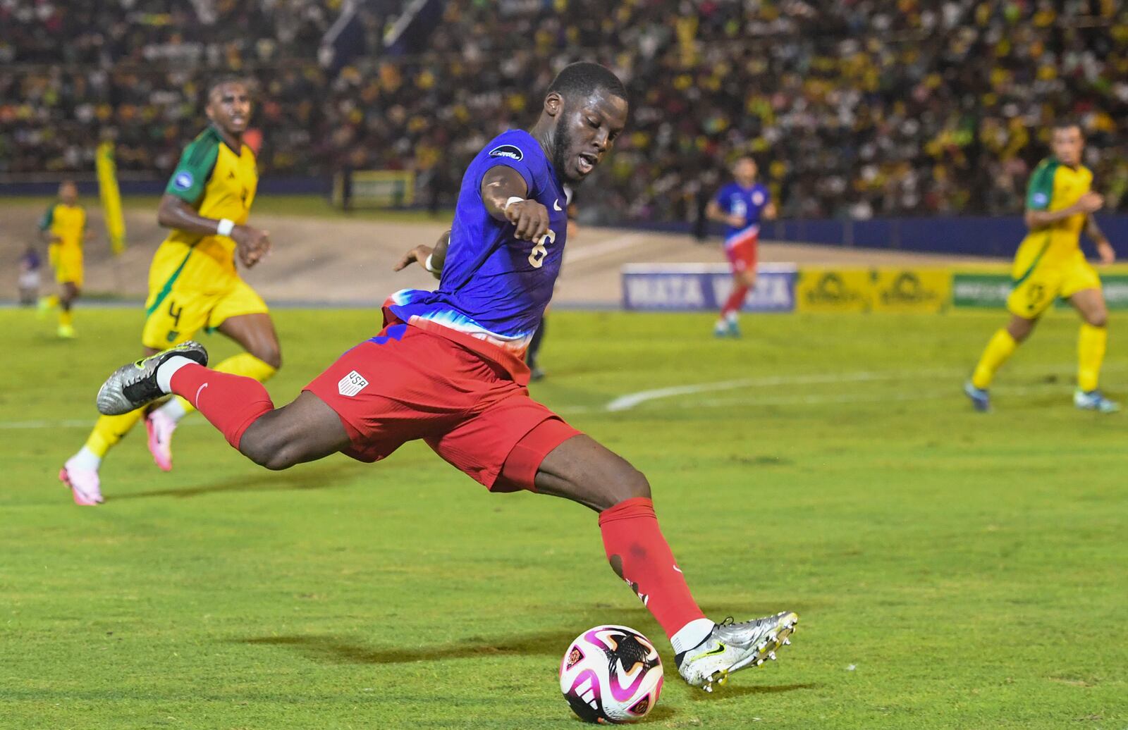 United States' Yunus Musah prepares shoots the ball against Jamaica during a CONCACAF Nations League quarterfinal first leg soccer match in Kingston, Jamaica, Thursday, Nov. 14, 2024. (AP Photo/Collin Reid)