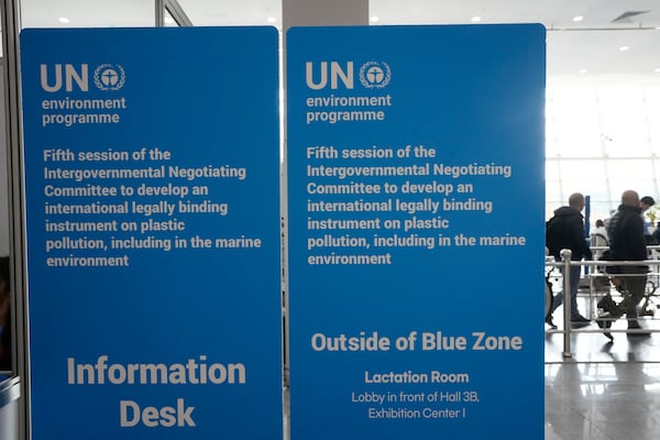 Signboards are displayed at the venue for the fifth session of the Intergovernmental Negotiating Committee on Plastic Pollution in Busan, South Korea, Friday, Nov. 29, 2024. (AP Photo/Ahn Young-joon)