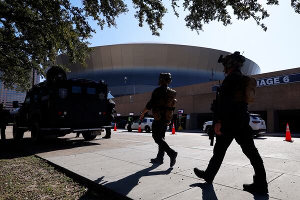 Local SWAT teams patrol outside the Ceasars Superdome ahead of the Sugar Bowl NCAA College Football Playoff game, Thursday, Jan. 2, 2025, in New Orleans. (AP Photo/Butch Dill)