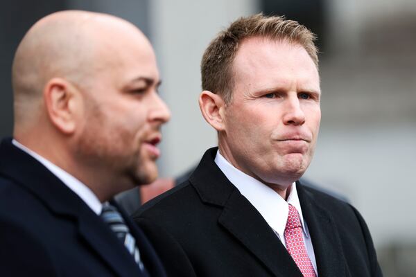 Andrew Giuliani looks on while attorney Joseph Cammarata speaks to the press outside of federal court, Thursday, Jan. 16, 2025, in New York. (AP Photo/Heather Khalifa)