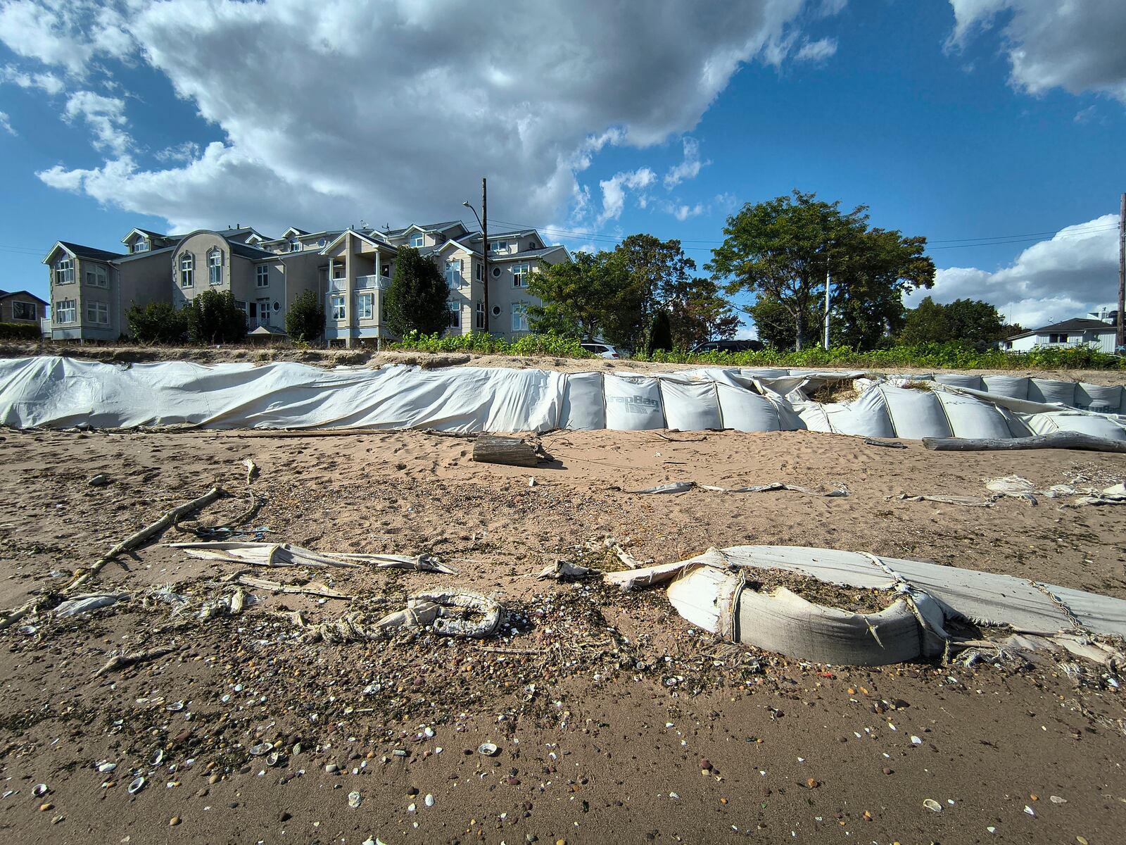 Sandbags installed after Hurricane Sandy can be seen after more than a decade of erosion Wednesday, Oct. 9, 2024, at a beach near Tottenville, Staten Island, at the southernmost tip of New York City. (AP Photo/Cedar Attanasio)