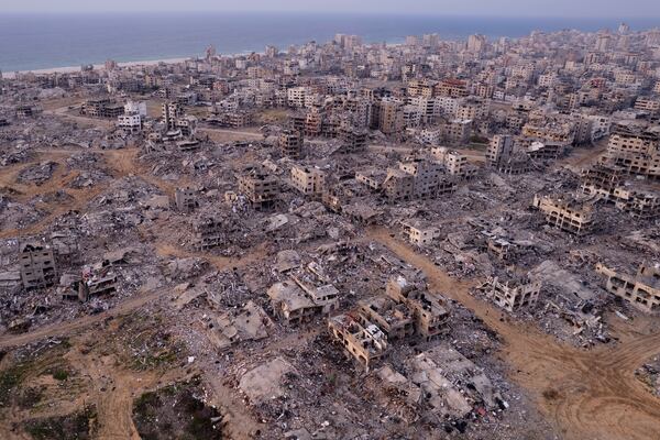 Buildings that were destroyed by the Israeli air and ground offensive are seen at the Tel al-Hawa neighbourhood in Gaza Strip, Tuesday, Jan. 28, 2025. (AP Photo/Mohamamd Abu Samra)