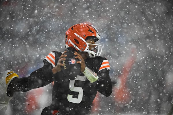 Cleveland Browns quarterback Jameis Winston (5) scrambles in the second half of an NFL football game against the Pittsburgh Steelers, Thursday, Nov. 21, 2024, in Cleveland. (AP Photo/David Richard)