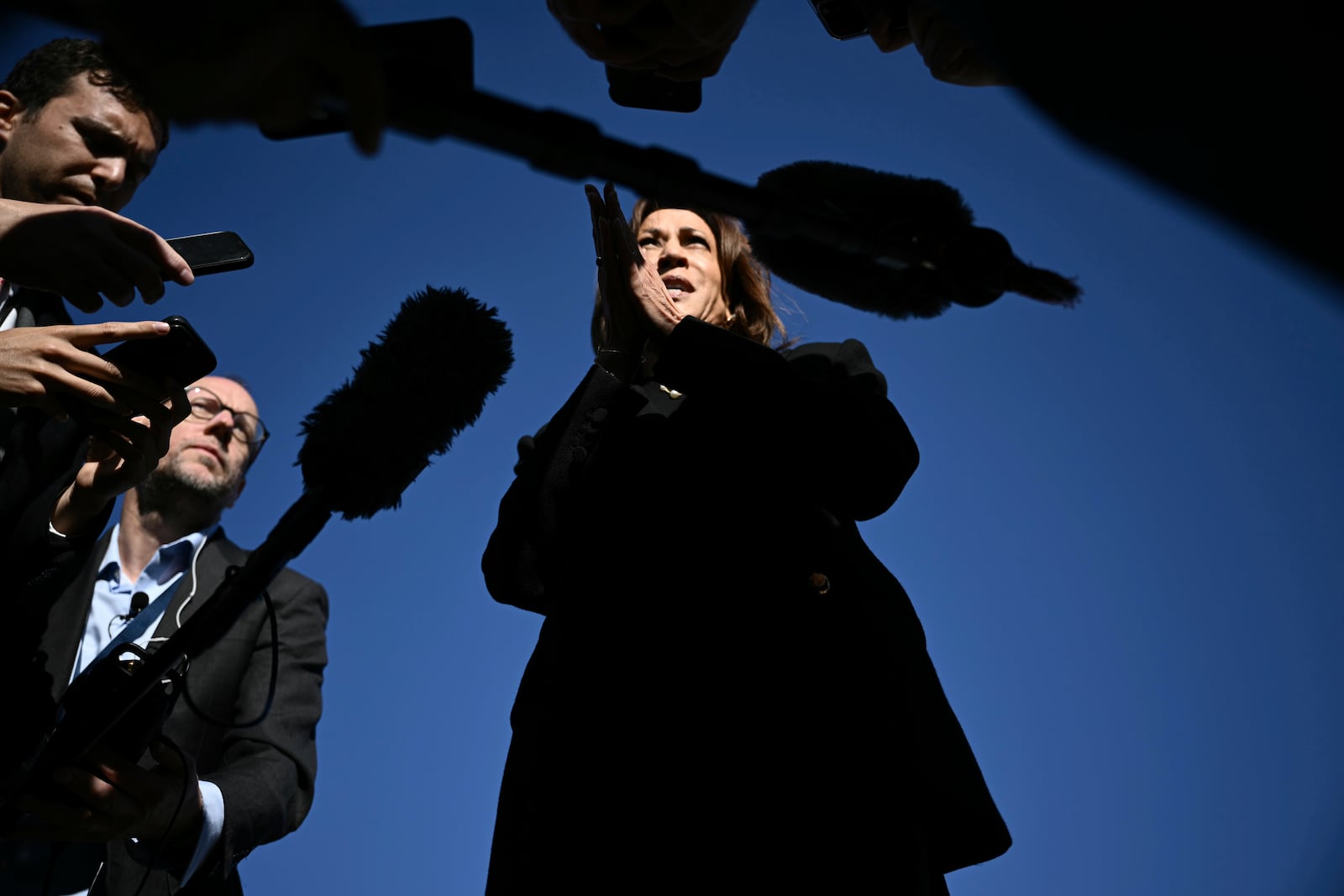 Democratic presidential nominee Vice President Kamala Harris talks to reporters before boarding Air Force Two, Wednesday, Oct. 30, 2024, at Joint Base Andrews, Md. (Brendan Smialowski/Pool via AP)