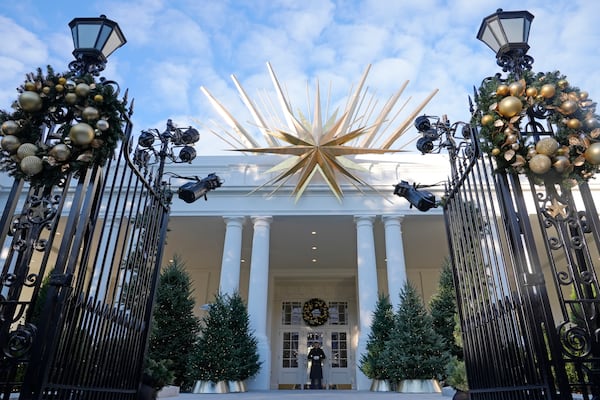 The East entrance of the White House in Washington, is decorated for the holidays, Monday, Dec. 2, 2024. (AP Photo/Susan Walsh)