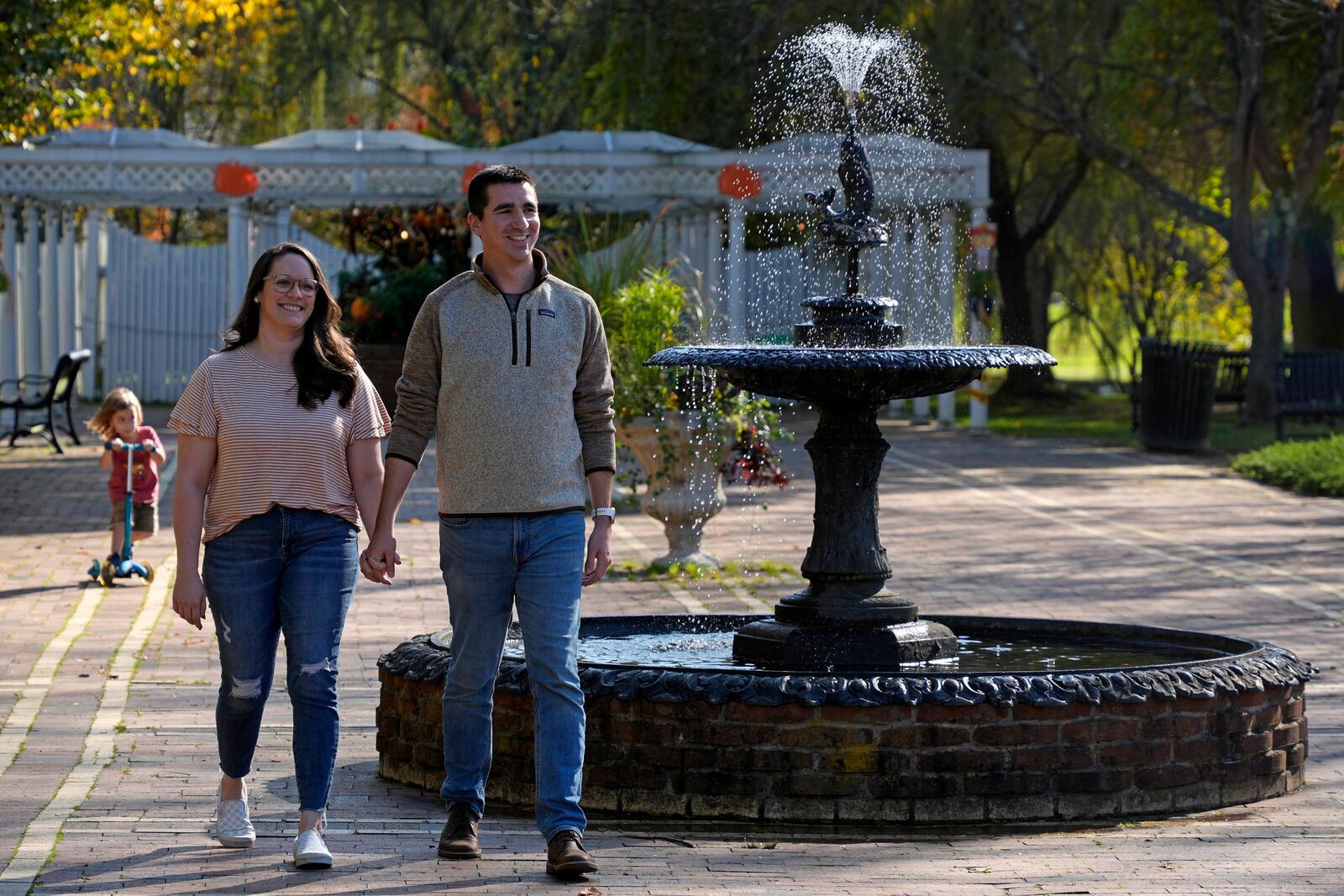 Marc Counterman and Stacy Counterman walk in Talleyrand Park in Bellefonte, Pa., Friday, Oct. 18, 2024. (AP Photo/Gene J. Puskar)